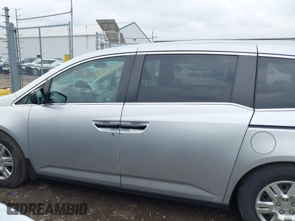 2011 Honda Odyssey LX with VIN 5FNRL5H25BB040287, listed as a IAAI auction lot 42456679 with 129,176 mi miles and . Bid and sale history available at DreamBid. Image 14.