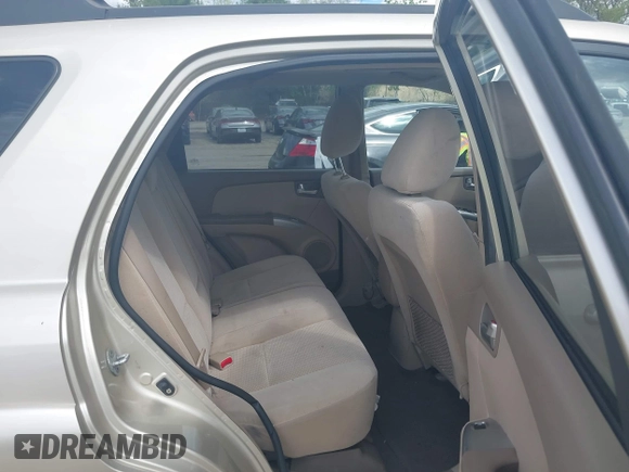 2009 Kia Sportage LX with VIN KNDJE723897625045, listed as a IAAI auction lot 42226159 with 201,266 mi miles and . Bid and sale history available at carsss.com. Image 8.