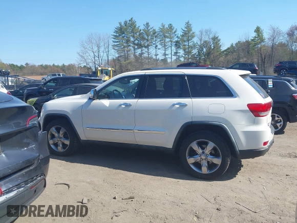 2011 Jeep Grand Cherokee Overland Summit with VIN 1J4RR6GT9BC546825, listed as a IAAI auction lot 42118789 with 123,449 mi miles. Bid and sale history available at carsss.com. Image 14.