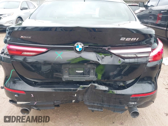 2021 BMW 2 Series 228i xDrive with VIN WBA73AK06M7H58799, listed as a IAAI auction lot 42172057 with 71,412 mi miles and . Bid and sale history available at DreamBid. Image 18.