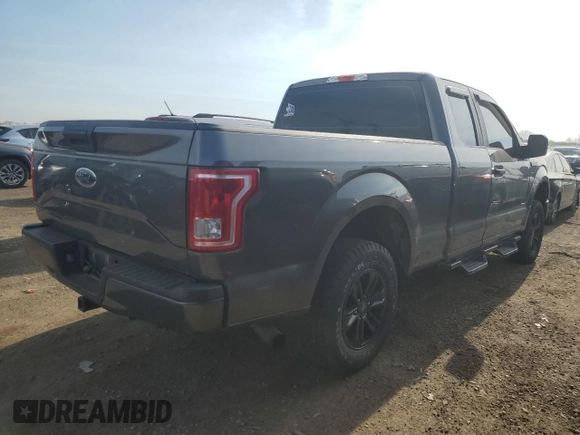 2015 Ford F-150 XLT with VIN 1FTEX1EP1FKE99188, listed as a Copart auction lot 54117115 with 201,077 mi miles and Salvage title. Bid and sale history available at DreamBid. Image 3.