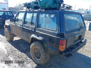 1996 Jeep Cherokee Country with VIN 1J4FJ78S8TL194375, listed as a IAAI auction lot 41286995 with 147,792 mi miles. Bid and sale history available at carsss.com. Image 3.