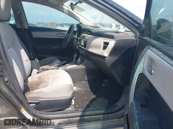 2015 Toyota Corolla L with VIN 5YFBURHE7FP255910, listed as a IAAI auction lot 42132289 with 97,635 mi miles and . Bid and sale history available at DreamBid. Image 5.