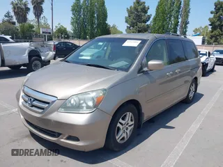 2005 Honda Odyssey EX-L with VIN 5FNRL38705B087733, listed as a IAAI auction lot 42165084 with 254,357 mi miles. Bid and sale history available at carsss.com. Image 6.