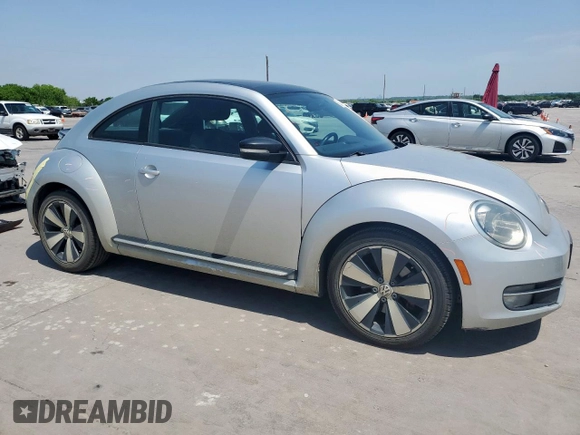 2012 Volkswagen Beetle with VIN 3VWV87AT7CM610251, listed as a Copart auction lot 52852395 with 77,550 mi miles and Salvage Title. Bid and sale history available at DreamBid. Image 4.