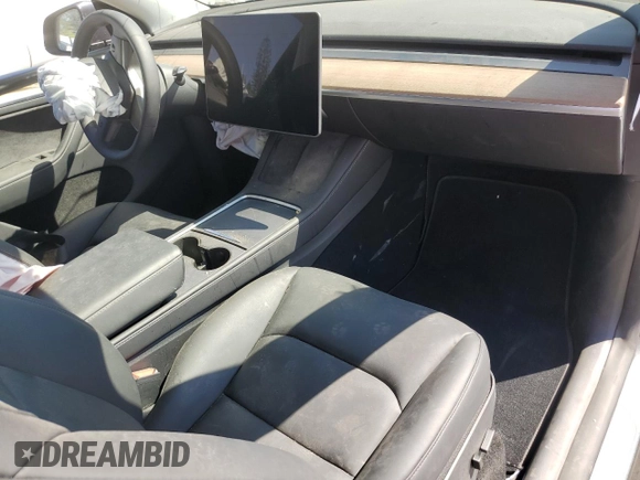 2024 Tesla Model Y Long Range с VIN 7SAYGDEE4RA243738, выставлен на аукционе Copart как лот 48953885 с пробегом Не указан миль и Списание • Salvage title. История ставок и продаж доступна на DreamBid. Изображение 8.