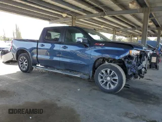 2022 Chevrolet Silverado 1500 LT with VIN 1GCUYDED5NZ218256, listed as a Copart auction lot 52565255 with 87,481 mi miles and Salvage Title. Bid and sale history available at DreamBid. Image 4.