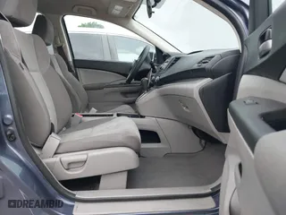 2014 Honda CR-V LX with VIN 3CZRM3H39EG703959, listed as a IAAI auction lot 41990964 with 87,424 mi miles. Bid and sale history available at carsss.com. Image 5.