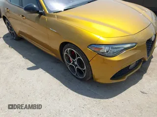 2023 Alfa Romeo Giulia Veloce with VIN ZARFANBN6P7670771, listed as a IAAI auction lot 42265457 with 60,911 mi miles and . Bid and sale history available at DreamBid. Image 1.