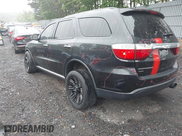 2013 Dodge Durango Crew with VIN 1C4RDJDG8DC675527, listed as a IAAI auction lot 42452197 with 184,981 mi miles and . Bid and sale history available at DreamBid. Image 3.
