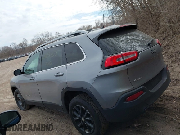 2016 Jeep Cherokee Latitude with VIN 1C4PJMCB7GW252724, listed as a IAAI auction lot 41869060 with 125,119 mi miles. Bid and sale history available at carsss.com. Image 14.