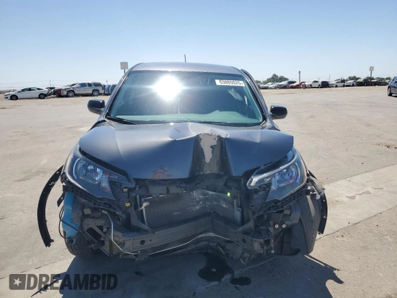 2013 Honda CR-V LX with VIN 2HKRM3H36DH509627, listed as a Copart auction lot 63880025 with 86,310 mi miles and Salvage title. Bid and sale history available at DreamBid. Image 5.