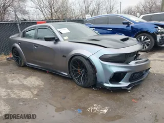 2020 Dodge Charger Scat Pack with VIN 2C3CDXGJ7LH157411, listed as a IAAI auction lot 41226695 with 52,108 mi miles. Bid and sale history available at carsss.com. Image 1.