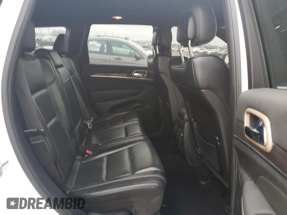2014 Jeep Grand Cherokee Overland with VIN 1C4RJFCG7EC572298, listed as a Copart auction lot 83970004 with 104,861 mi miles and Salvage Title. Bid and sale history available at DreamBid. Image 11.