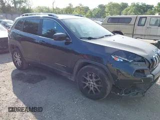 2014 Jeep Cherokee Latitude z VIN 1C4PJLCB0EW319381, wystawiony jako IAAI lot #42192779 z przebiegiem 152 959 mil mil oraz . Historia ofert i sprzedaży dostępna na DreamBid. Obrazek 1.