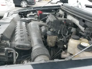 2007 Ford F-150 XLT z VIN 1FTRF02547KC32128, wystawiony jako IAAI lot #41616768 z przebiegiem 144 218 mil mil oraz . Historia ofert i sprzedaży dostępna na DreamBid. Obrazek 12.