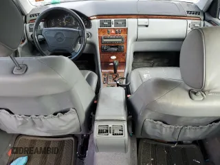1999 Mercedes-Benz E-Class with VIN WDBJF65H3XA882627, listed as a Copart auction lot 72476674 with 187,656 mi miles and Salvage Title. Bid and sale history available at carsss.com. Image 8.