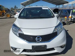 2016 Nissan Note SV with VIN 3N1CE2CP2GL408387, listed as a IAAI auction lot 41697373 with 196,494 mi miles and . Bid and sale history available at DreamBid. Image 13.