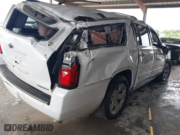 2019 Chevrolet Suburban Premier with VIN 1GNSKJKJ2KR354283, listed as a IAAI auction lot 39548082 with Not Provided miles and . Bid and sale history available at DreamBid. Image 4.
