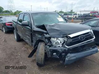 2015 Toyota Tacoma z VIN 3TMLU4EN1FM203143, wystawiony jako IAAI lot #42445912 z przebiegiem 57 444 mil mil oraz . Historia ofert i sprzedaży dostępna na DreamBid. Obrazek 1.