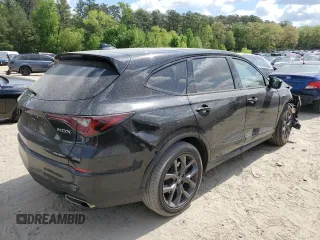 2023 Acura MDX w/A-Spec Package с VIN 5J8YE1H04PL031308, выставлен на аукционе Copart как лот 51929764 с пробегом 71 181 миль миль и Списание • Salvage title. История ставок и продаж доступна на DreamBid. Изображение 3.