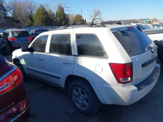 2009 Jeep Grand Cherokee Laredo with VIN 1J8GS48K29C518895, listed as a IAAI auction lot 41161045 with 153,499 mi miles. Bid and sale history available at carsss.com. Image 15.