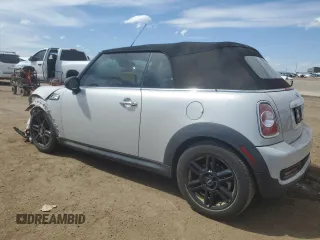 2015 MINI Convertible S z VIN WMWZP3C52FT298857, wystawiony jako Copart lot #58149145 z przebiegiem 52 777 mil mil oraz Szkoda całkowita • Salvage title. Historia ofert i sprzedaży dostępna na DreamBid. Obrazek 2.