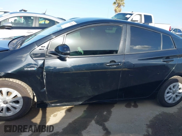 2020 Toyota Prius L Eco z VIN JTDKARFU6L3104385, wystawiony jako IAAI lot #41922029 z przebiegiem 123 235 mil mil oraz . Historia ofert i sprzedaży dostępna na DreamBid. Obrazek 14.