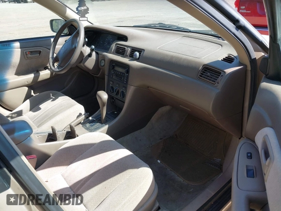 2001 Toyota Camry CE with VIN JT2BG22K910581703, listed as a IAAI auction lot 42020085 with 107,035 mi miles. Bid and sale history available at carsss.com. Image 5.