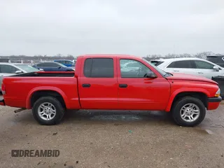 2004 Dodge Dakota Sport with VIN 1D7HL38KX4S657177, listed as a IAAI auction lot 41534575 with 38,802 mi miles. Bid and sale history available at carsss.com. Image 13.