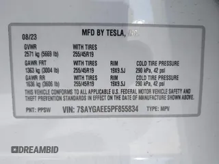 2023 Tesla Model Y Long Range with VIN 7SAYGAEE5PF855834, listed as a IAAI auction lot 41943491 with 34,480 mi miles. Bid and sale history available at carsss.com. Image 9.