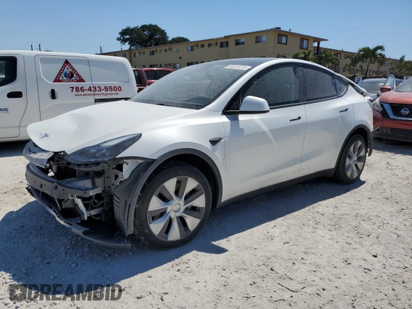 2023 Tesla Model Y Long Range with VIN 7SAYGDEEXPF770800, listed as a Copart auction lot 48324515 with 25,205 mi miles and Salvage Title. Bid and sale history available at DreamBid. Image 1.