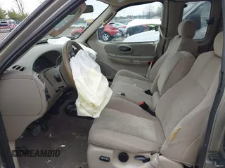 2003 Ford F-150 with VIN 2FTRX17L13CA34390, listed as a IAAI auction lot 41869497 with 114,221 mi miles and . Bid and sale history available at DreamBid. Image 5.