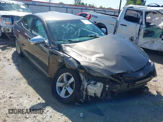 2015 Kia Optima LX with VIN 5XXGM4A70FG380776, listed as a IAAI auction lot 41976434 with 164,306 mi miles and . Bid and sale history available at DreamBid. Image 1.