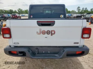 2023 Jeep Gladiator Overland z VIN 1C6HJTFG0PL514615, wystawiony jako Copart lot #57795945 z przebiegiem 32 427 mil mil oraz Czysty tytuł • Clean title. Historia ofert i sprzedaży dostępna na DreamBid. Obrazek 6.