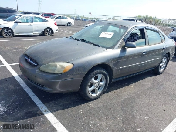 2003 Ford Taurus SE Standard with VIN 1FAFP53U73A172449, listed as a IAAI auction lot 41933160 with 230,002 mi miles. Bid and sale history available at carsss.com. Image 2.