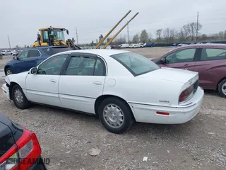 1999 Buick Park Avenue Ultra with VIN 1G4CU5217X4658627, listed as a IAAI auction lot 42013174 with 148,856 mi miles. Bid and sale history available at carsss.com. Image 14.