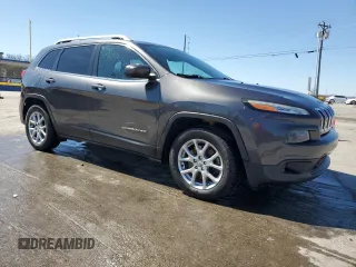2015 Jeep Cherokee Latitude with VIN 1C4PJLCS0FW707387, listed as a Copart auction lot 48953465 with 140,965 mi miles and Salvage Title. Bid and sale history available at carsss.com. Image 4.