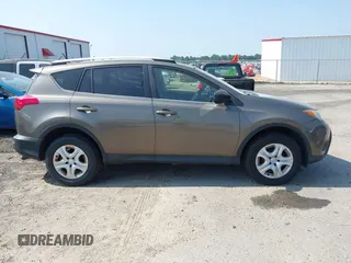 2014 Toyota RAV4 LE with VIN JTMZFREVXED034316, listed as a IAAI auction lot 42610135 with 214,871 mi miles and . Bid and sale history available at DreamBid. Image 14.