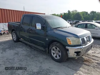 2004 Nissan Titan LE with VIN 1N6AA07A84N549757, listed as a IAAI auction lot 42083786 with 313,053 mi miles. Bid and sale history available at carsss.com. Image 1.