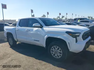 2024 Toyota Tacoma 4WD SR5 with VIN 3TMLB5JN8RM007805, listed as a IAAI auction lot 41120238 with 2,717 mi miles. Bid and sale history available at carsss.com. Image 1.