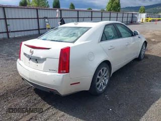 2009 Cadillac CTS AWD z VIN 1G6DT57V090104530, wystawiony jako IAAI lot #42314043 z przebiegiem 96 109 mil mil oraz . Historia ofert i sprzedaży dostępna na DreamBid. Obrazek 4.