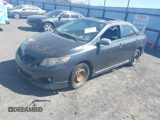 2009 Toyota Corolla with VIN 1NXBU40E39Z039148, listed as a IAAI auction lot 41830186 with 300,207 mi miles. Bid and sale history available at carsss.com. Image 2.