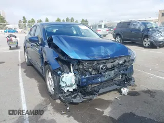 2018 Mazda 3 Touring z VIN 3MZBN1L32JM274060, wystawiony jako IAAI lot #41666570 z przebiegiem 63 618 mil mil oraz . Historia ofert i sprzedaży dostępna na DreamBid. Obrazek 1.