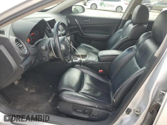 2011 Nissan Maxima SV with VIN 1N4AA5AP9BC861601, listed as a Copart auction lot 52743865 with 149,987 mi miles and Salvage Title. Bid and sale history available at DreamBid. Image 7.