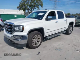2017 GMC Sierra 1500 SLT with VIN 3GTP1NECXHG423591, listed as a IAAI auction lot 41509177 with 100,071 mi miles and . Bid and sale history available at DreamBid. Image 2.