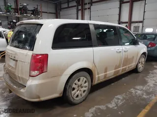 2018 Dodge Grand Caravan SE with VIN 2C4RDGBG0JR180361, listed as a IAAI auction lot 41064126 with 135,841 mi miles. Bid and sale history available at carsss.com. Image 4.