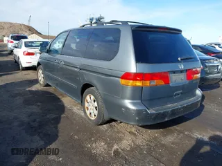 2002 Honda Odyssey EX-L z VIN 5FNRL180X2B022889, wystawiony jako IAAI lot #41546405 z przebiegiem 162 395 mil mil oraz . Historia ofert i sprzedaży dostępna na DreamBid. Obrazek 3.