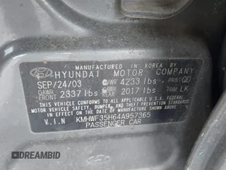 2004 Hyundai Sonata GLS with VIN KMHWF35H64A957365, listed as a IAAI auction lot 42150369 with 247,348 mi miles. Bid and sale history available at carsss.com. Image 9.