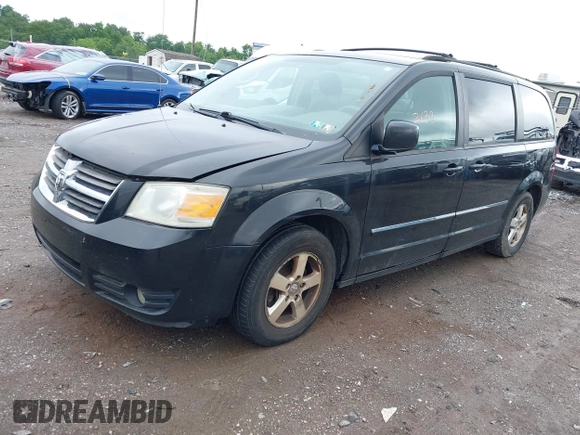 2009 Dodge Grand Caravan SXT z VIN 2D8HN54109R596185, wystawiony jako IAAI lot #42382133 z przebiegiem 207 882 mil mil oraz . Historia ofert i sprzedaży dostępna na DreamBid. Obrazek 2.